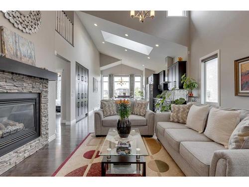 47 Legacy Circle Se, Calgary, AB - Indoor Photo Showing Living Room With Fireplace