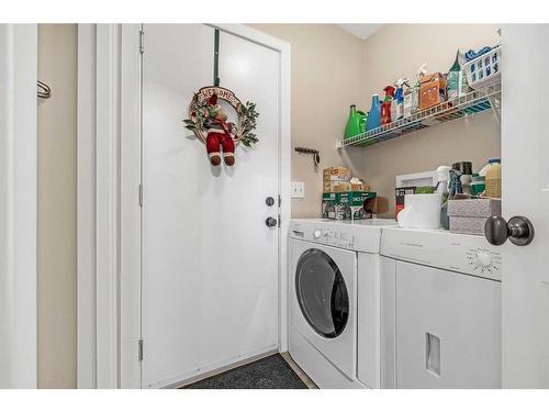 87 Bridlecrest Street Sw, Calgary, AB - Indoor Photo Showing Laundry Room