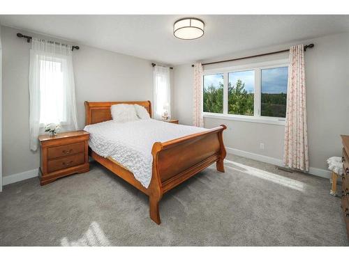 413 Silverado Ranch Manor Sw, Calgary, AB - Indoor Photo Showing Bedroom