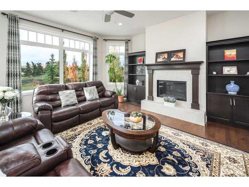 413 Silverado Ranch Manor Sw, Calgary, AB - Indoor Photo Showing Living Room With Fireplace