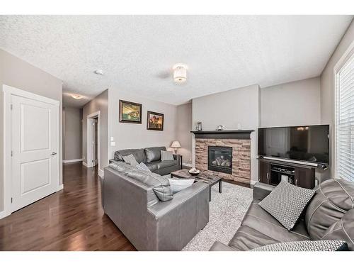 18 Rockford Road Nw, Calgary, AB - Indoor Photo Showing Living Room With Fireplace