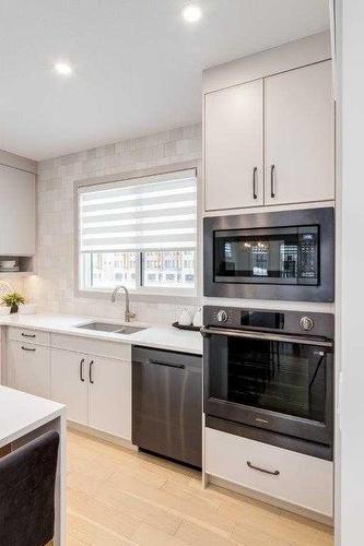 75 Greenbriar Place Nw, Calgary, AB - Indoor Photo Showing Kitchen With Upgraded Kitchen