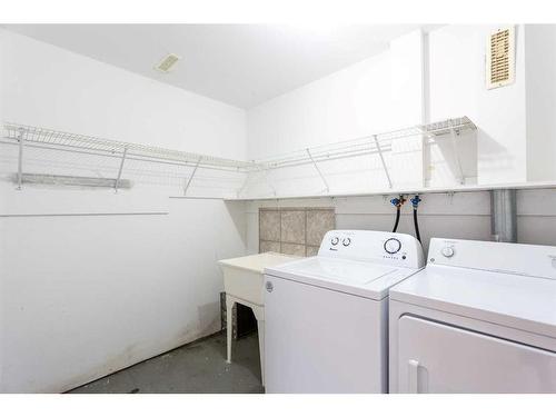 435 Evermeadow Road Sw, Calgary, AB - Indoor Photo Showing Laundry Room