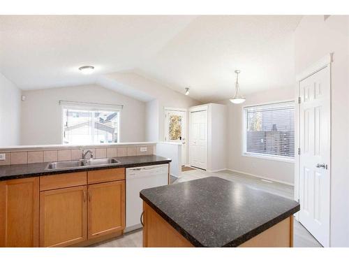435 Evermeadow Road Sw, Calgary, AB - Indoor Photo Showing Kitchen With Double Sink