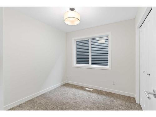 36 Carringvue Passage Nw, Calgary, AB - Indoor Photo Showing Other Room