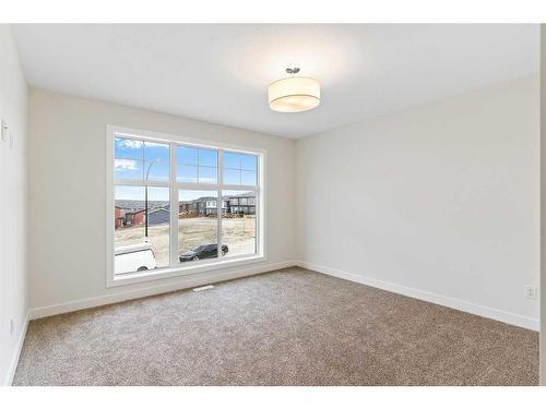 36 Carringvue Passage Nw, Calgary, AB - Indoor Photo Showing Other Room
