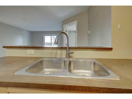 6104-70 Panamount Drive Nw, Calgary, AB - Indoor Photo Showing Kitchen With Double Sink
