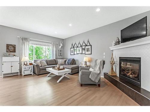 603 Auburn Bay Heights Se, Calgary, AB - Indoor Photo Showing Living Room With Fireplace