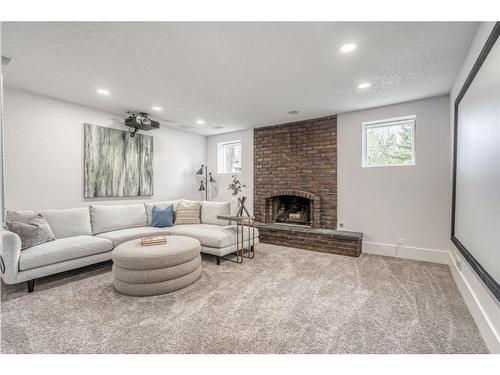 1206 Varsity Estates Road Nw, Calgary, AB - Indoor Photo Showing Living Room With Fireplace