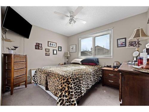115 Deerview Court Se, Calgary, AB - Indoor Photo Showing Bedroom