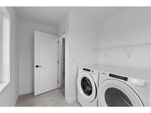 187 Baneberry Way Sw, Airdrie, AB - Indoor Photo Showing Laundry Room