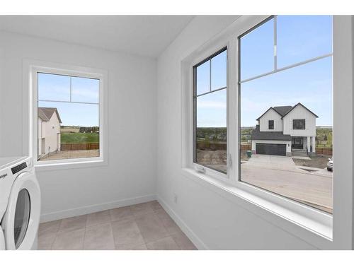 187 Baneberry Way Sw, Airdrie, AB - Indoor Photo Showing Laundry Room