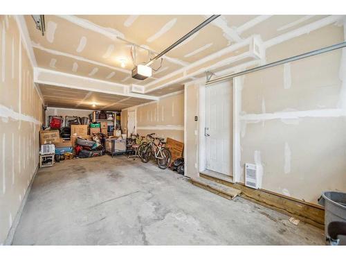 33 Sherwood Row Nw, Calgary, AB - Indoor Photo Showing Garage