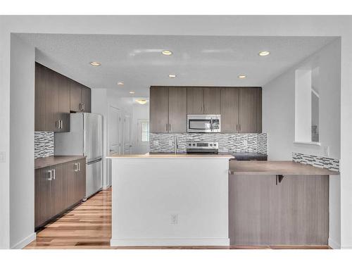 314 Auburn Crest Way Se, Calgary, AB - Indoor Photo Showing Kitchen With Stainless Steel Kitchen