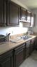 1339 37 Street Se, Calgary, AB  - Indoor Photo Showing Kitchen With Double Sink 