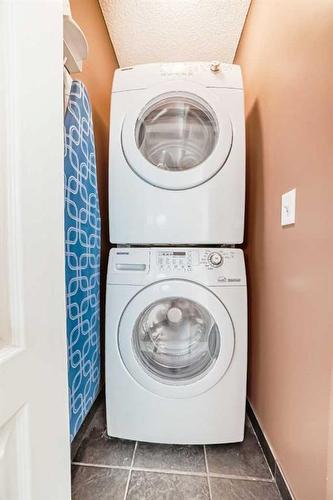 70 Country Hills Gardens Nw, Calgary, AB - Indoor Photo Showing Laundry Room