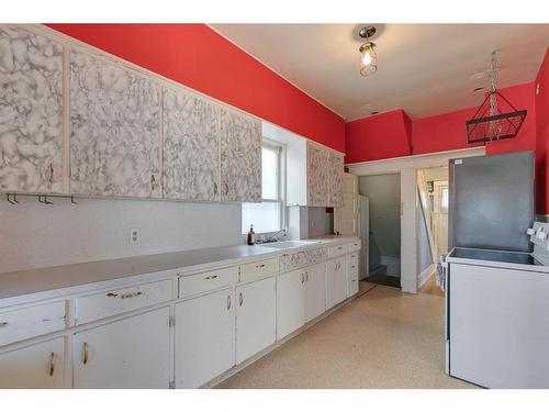 1125 7A Street Nw, Calgary, AB - Indoor Photo Showing Laundry Room
