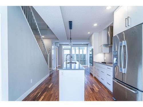 210-2717 17 Street Sw, Calgary, AB - Indoor Photo Showing Kitchen With Stainless Steel Kitchen With Upgraded Kitchen