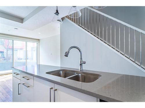 210-2717 17 Street Sw, Calgary, AB - Indoor Photo Showing Kitchen With Double Sink