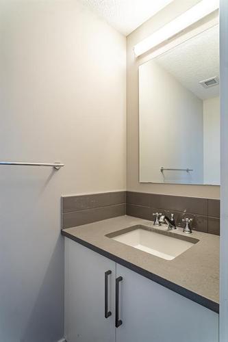 210-2717 17 Street Sw, Calgary, AB - Indoor Photo Showing Bathroom