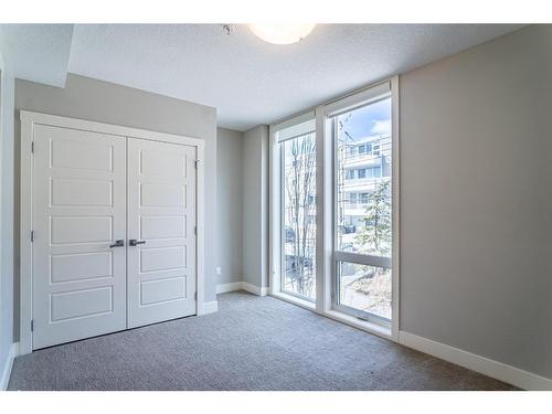 210-2717 17 Street Sw, Calgary, AB - Indoor Photo Showing Other Room