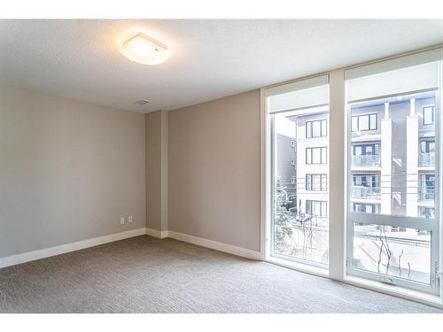 210-2717 17 Street Sw, Calgary, AB - Indoor Photo Showing Other Room