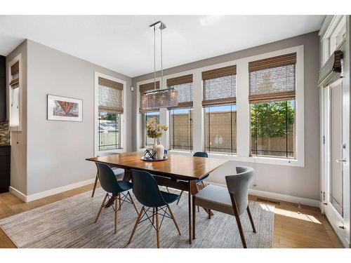 96 Mike Ralph Way Sw, Calgary, AB - Indoor Photo Showing Dining Room