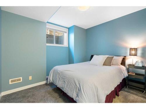 96 Mike Ralph Way Sw, Calgary, AB - Indoor Photo Showing Bedroom