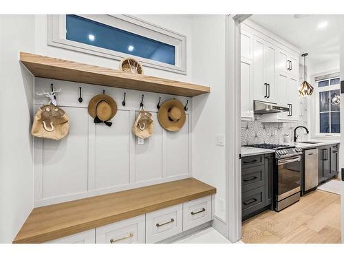 1473 Coopers Landing Sw, Airdrie, AB - Indoor Photo Showing Kitchen