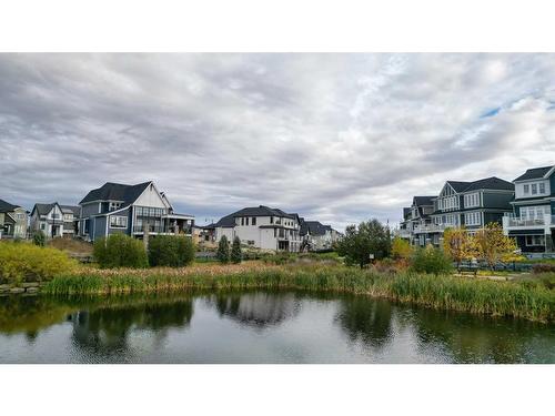 1473 Coopers Landing Sw, Airdrie, AB - Outdoor With Body Of Water