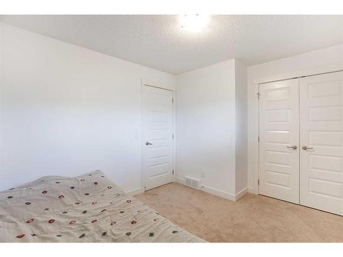 250 Covecreek Circle Ne, Calgary, AB - Indoor Photo Showing Bedroom