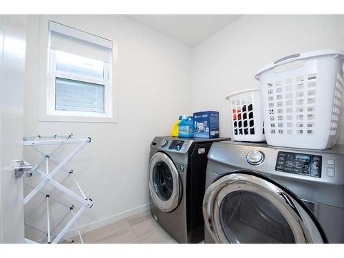 328 Copperhead Way Se, Calgary, AB - Indoor Photo Showing Laundry Room