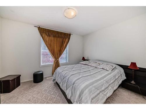 233 Eversyde Boulevard Sw, Calgary, AB - Indoor Photo Showing Bedroom