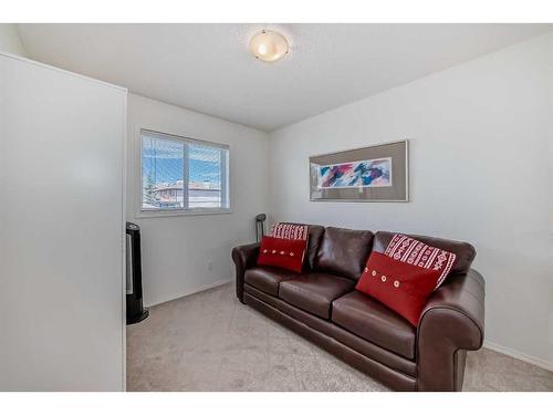 233 Eversyde Boulevard Sw, Calgary, AB - Indoor Photo Showing Living Room