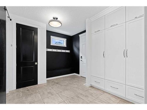 29 Aspen Summit Circle Sw, Calgary, AB - Indoor Photo Showing Other Room