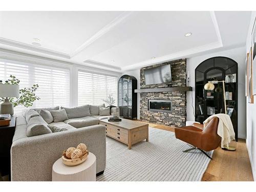 29 Aspen Summit Circle Sw, Calgary, AB - Indoor Photo Showing Living Room With Fireplace