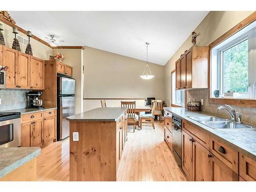 112 Derochie Drive, Claresholm, AB - Indoor Photo Showing Kitchen With Double Sink
