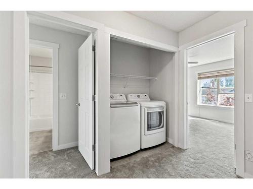 113 Country Village Cape Ne, Calgary, AB - Indoor Photo Showing Laundry Room