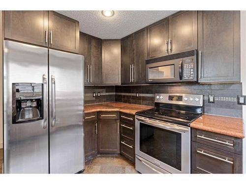 3 Shawmeadows Crescent Sw, Calgary, AB - Indoor Photo Showing Kitchen With Stainless Steel Kitchen