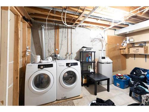 3 Shawmeadows Crescent Sw, Calgary, AB - Indoor Photo Showing Laundry Room