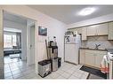 3917 29 Avenue Se, Calgary, AB  - Indoor Photo Showing Kitchen With Double Sink 