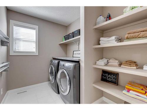 101 Legacy Green Se, Calgary, AB - Indoor Photo Showing Laundry Room