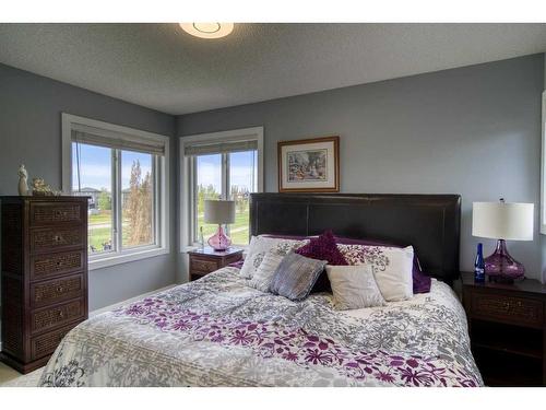 505 Lakeside Greens Place, Chestermere, AB - Indoor Photo Showing Bedroom