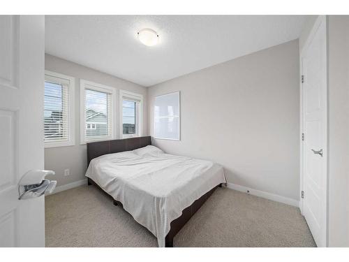 25 Redstone Villas Ne, Calgary, AB - Indoor Photo Showing Bedroom