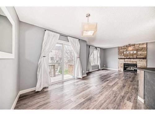 33 Royal Elm Mews Nw, Calgary, AB - Indoor With Fireplace