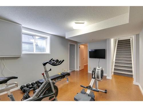 7 Cathedral Road Nw, Calgary, AB - Indoor Photo Showing Gym Room