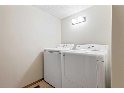 236 Templeby Place Ne, Calgary, AB - Indoor Photo Showing Laundry Room