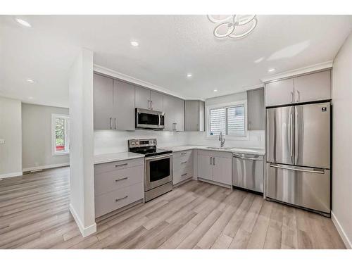 104 Abberfield Place Ne, Calgary, AB - Indoor Photo Showing Kitchen With Stainless Steel Kitchen With Upgraded Kitchen