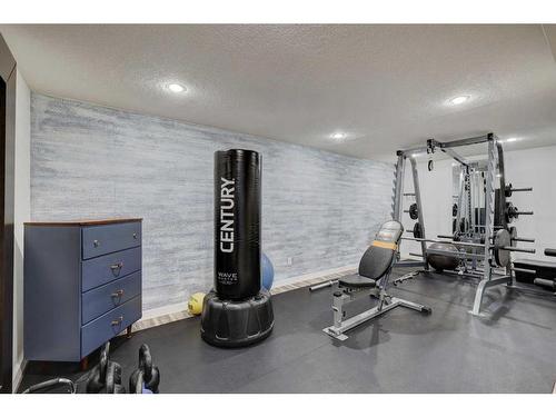 143 Sackville Drive Sw, Calgary, AB - Indoor Photo Showing Gym Room