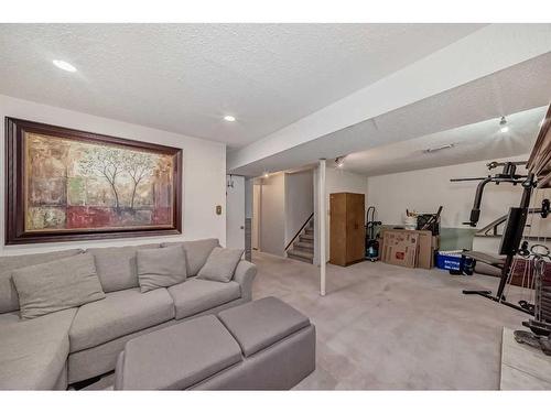 231 Penmeadows Close Se, Calgary, AB - Indoor Photo Showing Living Room